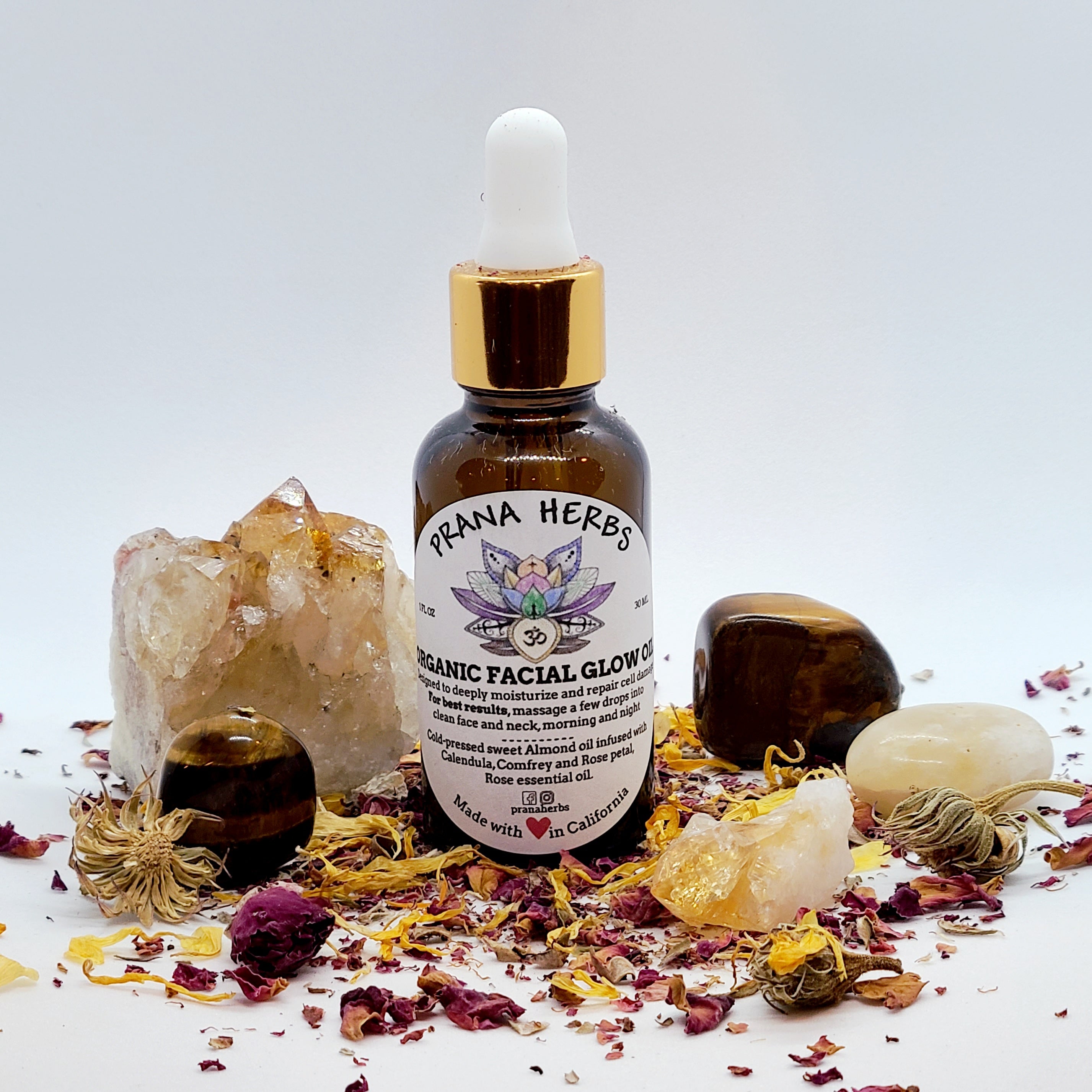 Organic facial glow oil with calendula rose comfrey citrine crystals tigers eye